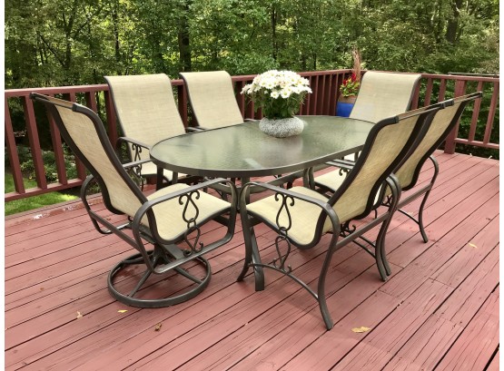 Glass And Metal Oval Outdoor Table And Two Swivel Chairs And Four Side Chairs