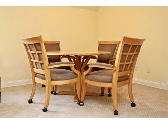 Round Drop Leaf  Pedestal Table And Four Coordinating Upholstered Chairs On Casters