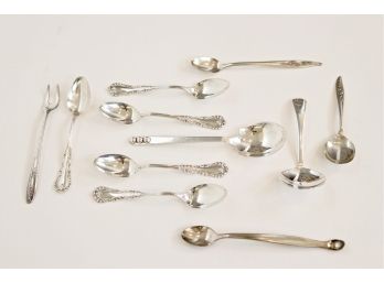 Set Of 11 Sterling Silver Spoons In Various Sizes
