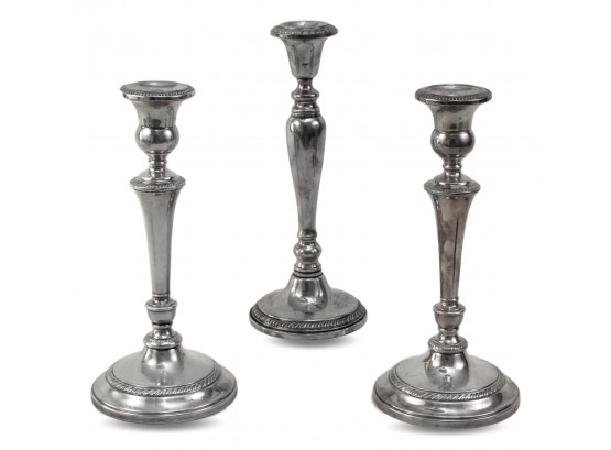 Pair Of  Revere Silversmiths Weighted Sterling Silver Candlestick Holders With Rope Band Design