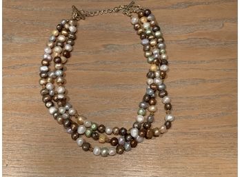 Three String Beaded Necklace In Natural Tones