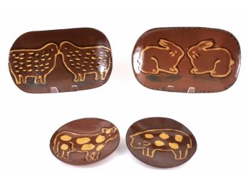 Four Signed Animal Pottery Plates