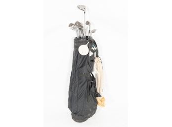 Collection Of Nine Golf Clubs In Bag