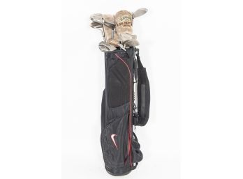 Collection Of Twelve Golf Clubs In Nike Bag