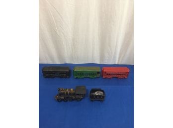 Cast-iron Train Set With Connectors On Wheels That Role Heavy Pieces