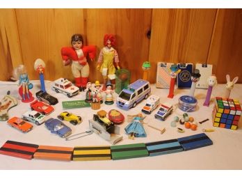 Vintage Toy Collection Including Ronald McDonald, Pez, Matchboxes, Rubik's Cube, Marbles, Yoyo Etc.