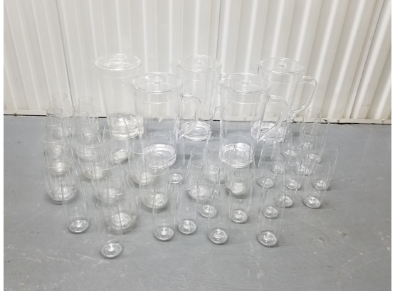Large Collection Of Clear Acrylic Lidded Beverage Servers And Tumblers