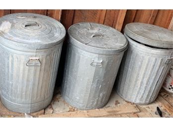 Three  Aluminum Garbage Cans