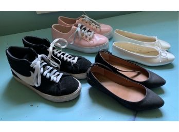 Four Pairs Of Shoes