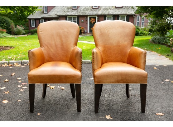Pair Of Distressed Leather Arm Chairs With Nailhead Studs