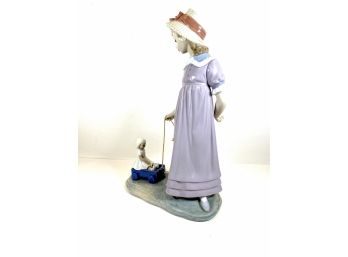 Lladro - Woman And Baby In Crate Wagon