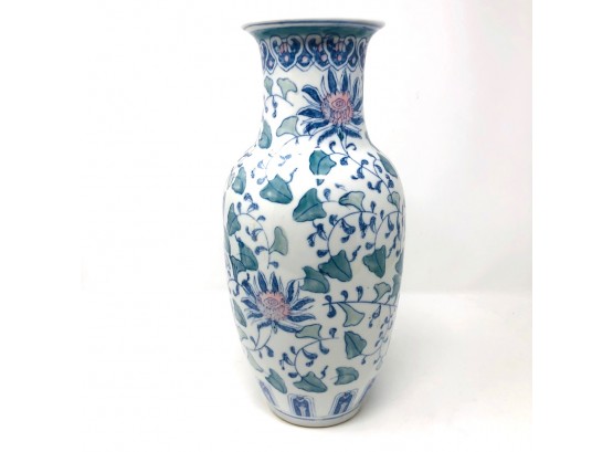 White Floral-Patterned Porcelain Vase With Green, Blue, And Pink Accents