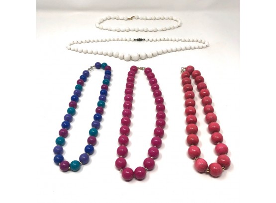 Five Ball Necklaces In Various Colors