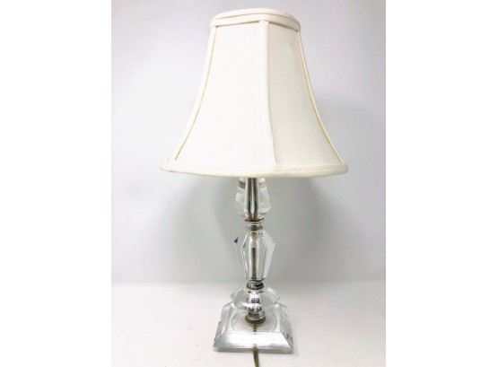 Transparent Table Lamp With Metal Accents And White Lampshade