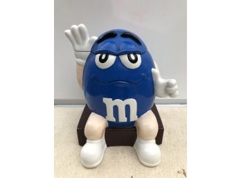 Blue M & M Sitting On M & M's Cookie Jar
