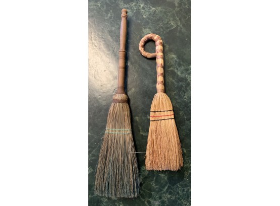 Two Wisk Brooms