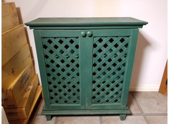 Green Faux Distressed Cabinet With Latticework Doors