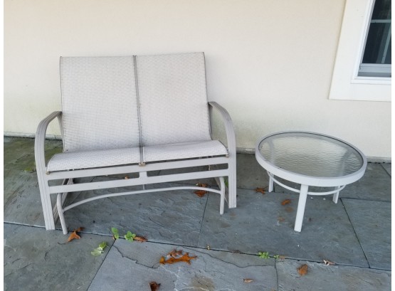 Outdoor Metal And Mesh Loveseat Glider Bench And Glass Top Round End Table