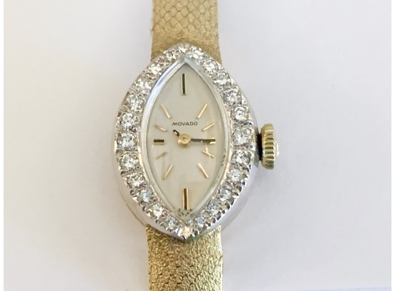 A 14K Gold And Diamond Lady's Watch By Movado