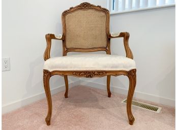 A French Provincial Style Fauteuil With Caned Paneled Back