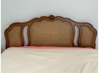 A Vintage Carved And Caned Headboard With Frame, Mattress And Boxspring