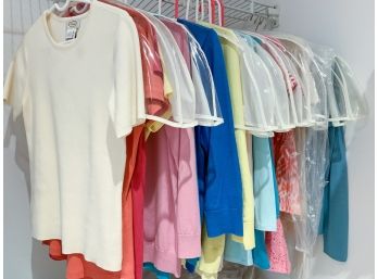A Large Collection Of Cardigans In A Rainbow Of Colors