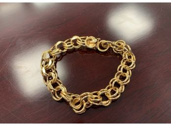 A 14K Gold Charm Bracelet