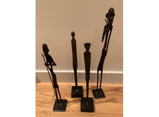 Four  Bronze Figures From Various Countries