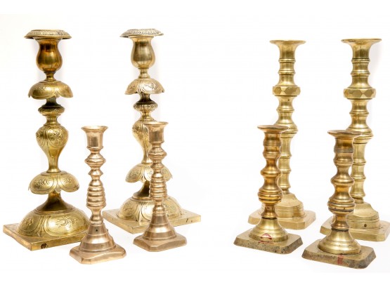 Eight Russian And Early American Brass Candlestick Holders