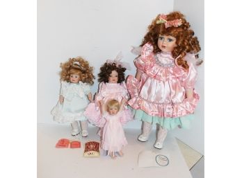 Four Assorted Vintage Porcelain Dolls