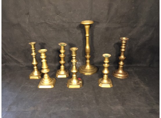 Eight Brass Candle Sticks