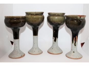 Set Of Four Glazed Pottery Goblets