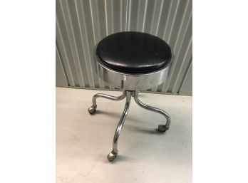 Mid Century Modern Chrome And Leatherette Stool On Casters