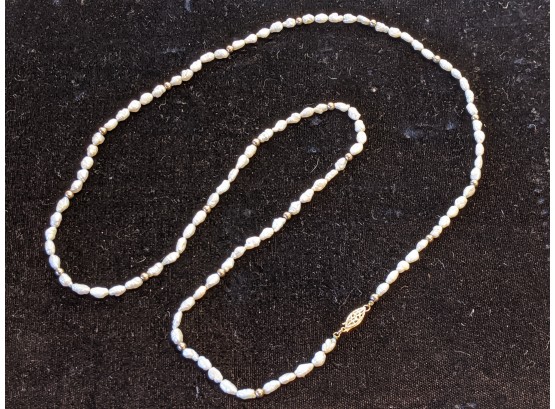 32' Rice Pearl Opera Necklace With 14K Yellow Gold Clasp And Beads