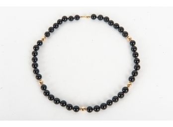 Black Beaded & 14 Karat Gold Detail Necklace