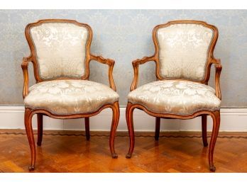 Pair Of Carved Wood Silk Floral Upholstered Arm Chairs