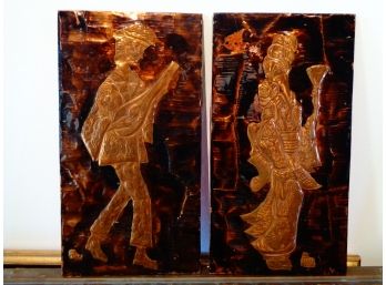 Pair Of Hammered Copper Artwork
