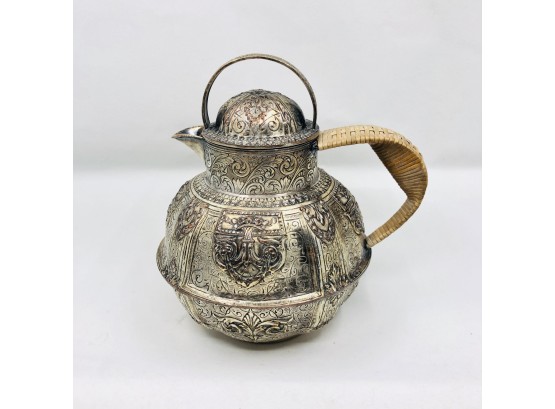One Pint Repousse Teapot With Wicker Handle