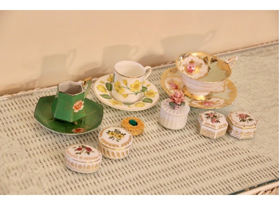 Delicate Teacups And Porcelain Trinket Boxes