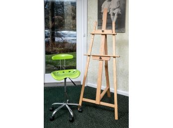 Wood Easel With Green Swivel Metal Chair