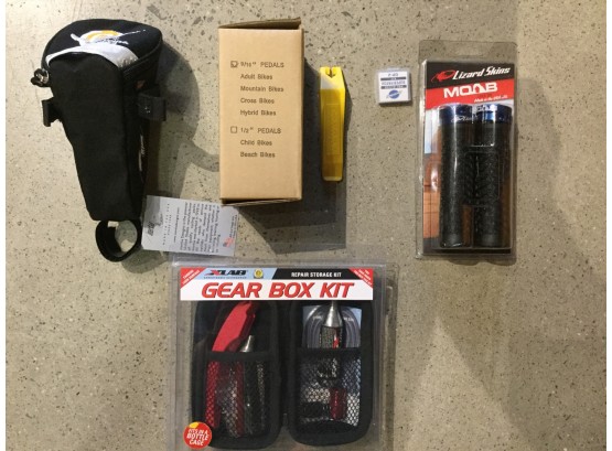 Mixed Lot Including Xlab Gear Box Kit, Lizard Skins Moab Bike Grips, And Bike Accessories, Retail $93 Total
