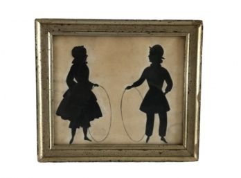 Silhouette Of Boy And Girl With Hoops