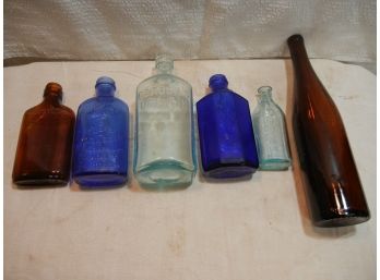 Six Old Colored Bottles