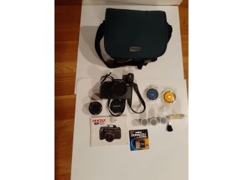 Pentax SF10 35mm SLR Camera With 2 Lenses, Filters, Film, Battery & Carry Bag