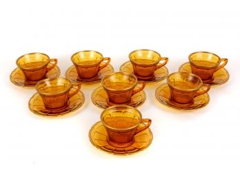 Set Of Eight Amber Tea Cups And Saucers