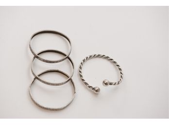 Four Sterling Silver Bangle Bracelets (47.5g)