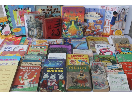 Table Full Of Vintage Children's Books With Little Golden Books, Dr. Seuss, Heidi, Lassie, Berenstain' Bears