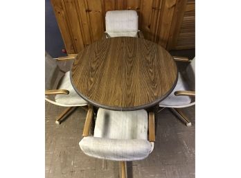 MCM Solid Oak Table And 4 Chrome Craft Corp. Rolling Chairs