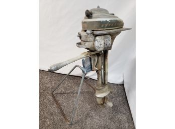 Antique Evinrude Boat Motor And Stand, Frozen