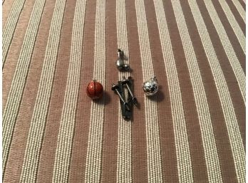 Four Sterling Silver Sports Themed Charms